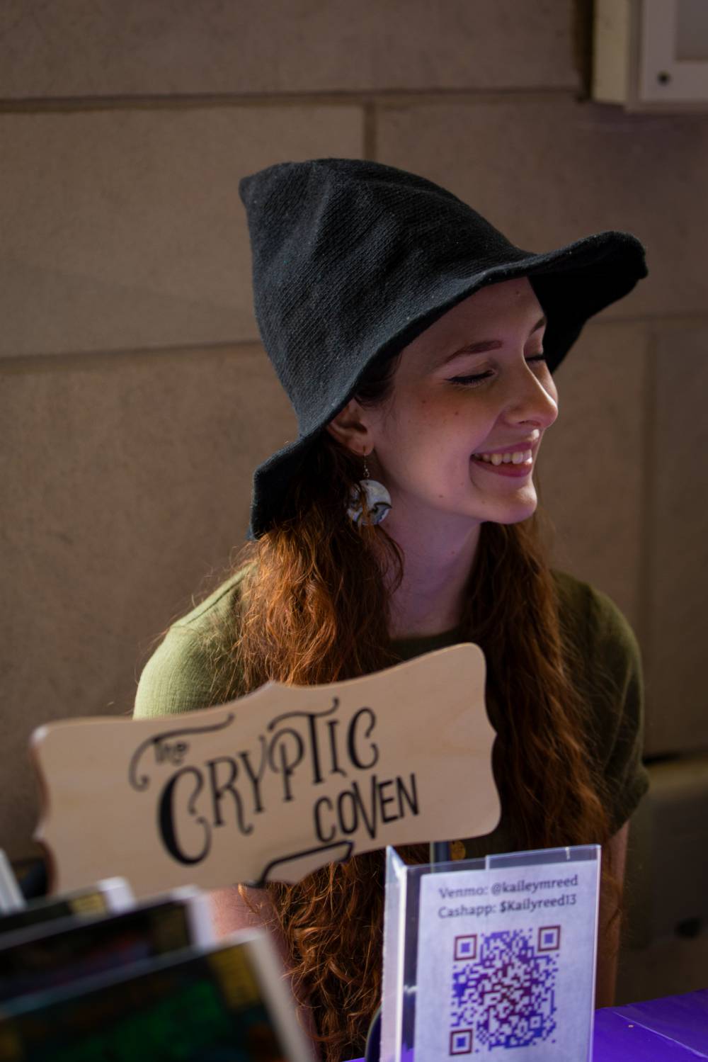 Student at The Cryptic Coven booth during Student Small Business Market.